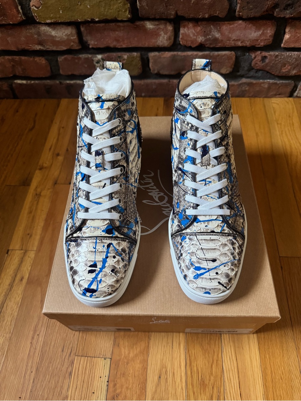 High-Top Python Effect Sneakers with Blue Paint Splatter